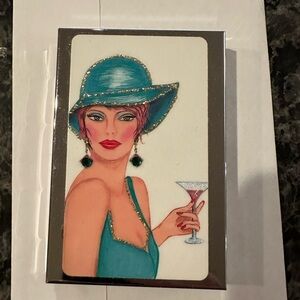 Calculator/card case.  Gently pre-owned.  Note some scratches on back.